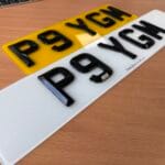 Short belled number plates