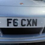 Number plate spacing done correctly: F6 CXN private plate on a Porsche