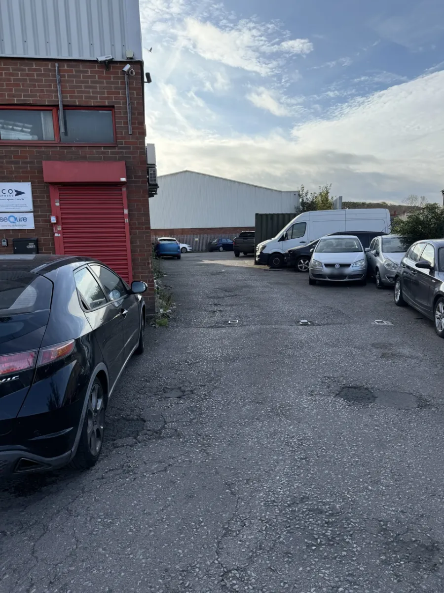 Access road leading to the Unit 5 car park at the Freehold Centre